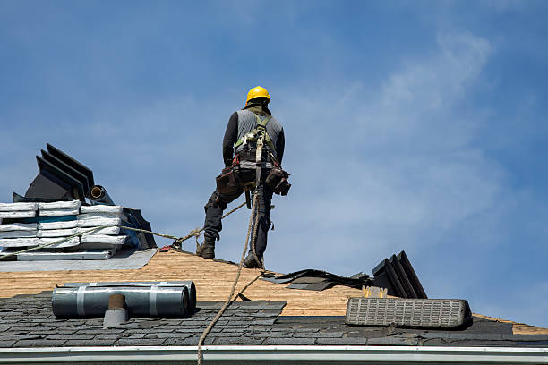 Professional Metal Roofing technician working in Woodburn, IN